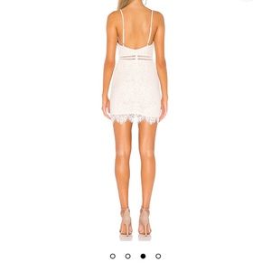 Remi lace mini dress in white